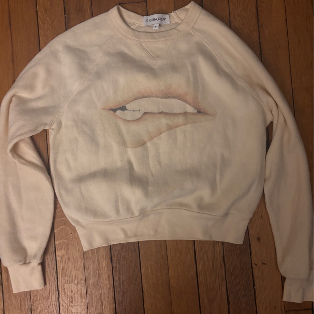Shonna Drew Cream Sweatshirt  with Artistic Design